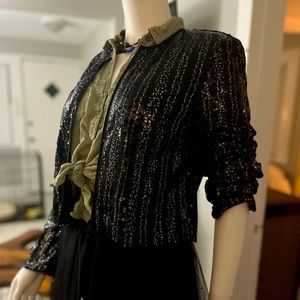 Sparkly black and silver sequined jacket by Christian Siriano